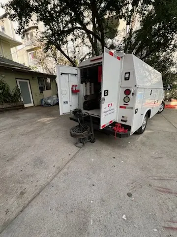 Magnet Plumbing service vehicle on-site for Grease Trap Cleaning in Panorama